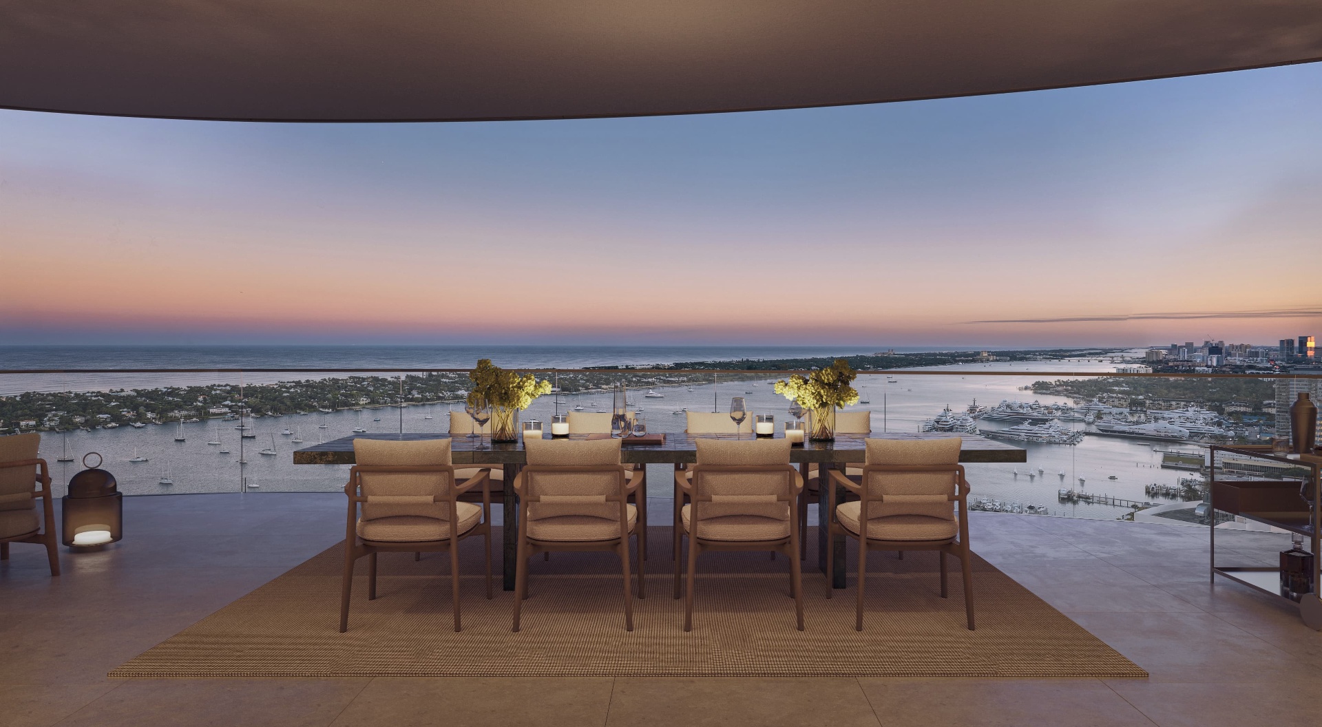 Penthouse terrace at dusk overlooking the Intracoastal, Palm Beach, and the Atlantic